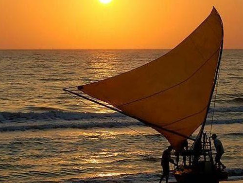 Passeio de jangada pela linda Praia de Quixaba